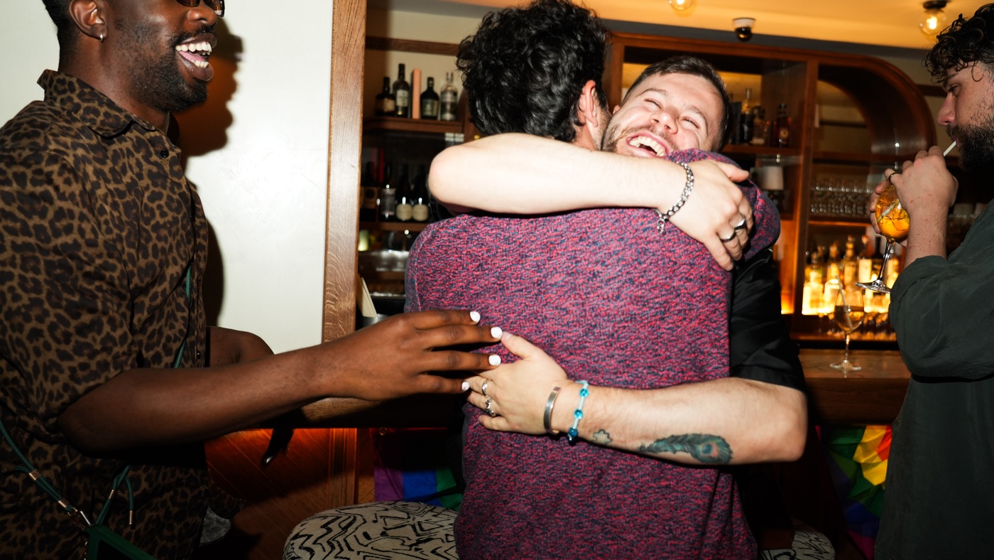Men Hugging at Pride Event, 1 Warwick by Maslow's, Soho London Members House