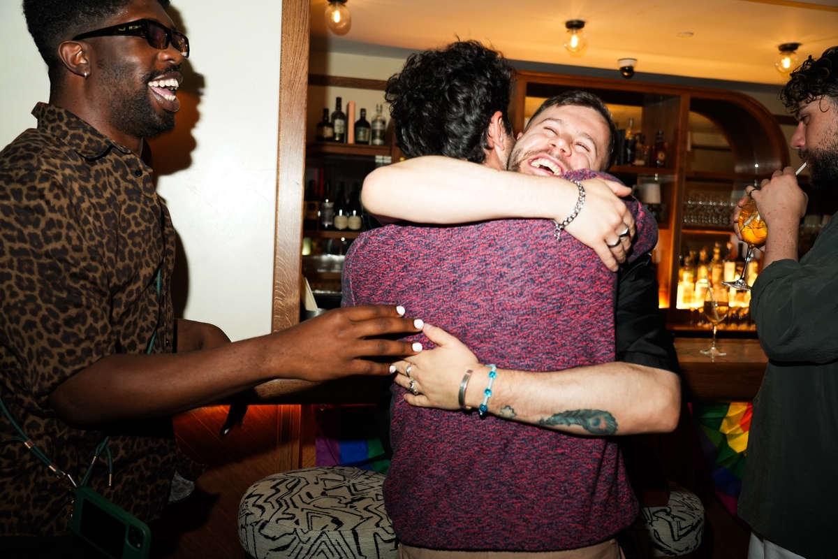 Men Hugging at Pride Event, 1 Warwick by Maslow's, Soho London Members House