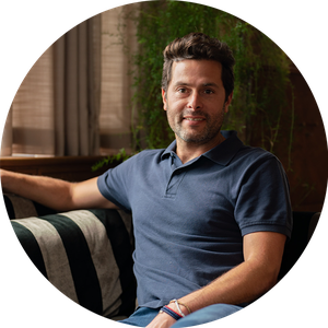 Guy Ivesha, Maslow's Founder and CEO in a Relaxed Seated Position at Mortimer Hosue