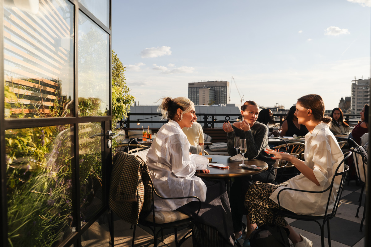 People Socialising at Mortimer House Rooftop, Fitzrovia London